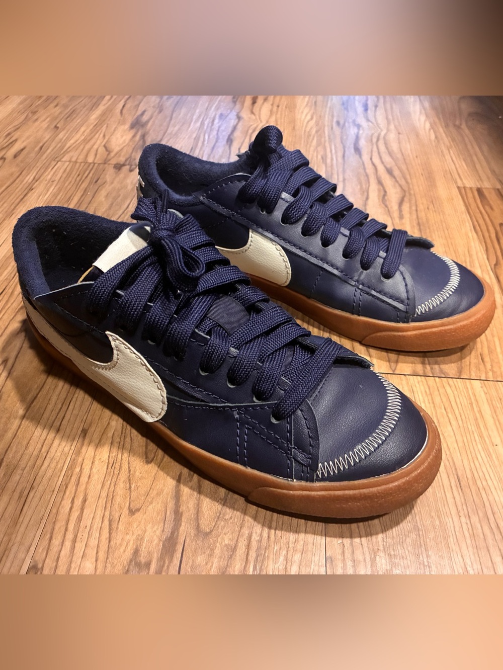Nike blazer 77 low tops in Navy Leather with White Swoosh and Gum Sole